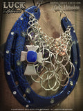 Cobalt Faith Lucky Horseshoe is accented with sparkling white and silver Swarovski crystals. 